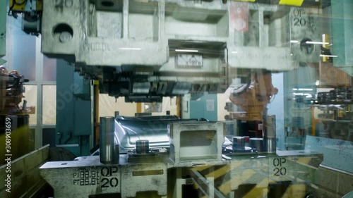 Stamping metal sheets for car parts. Automotive manufacturing industry