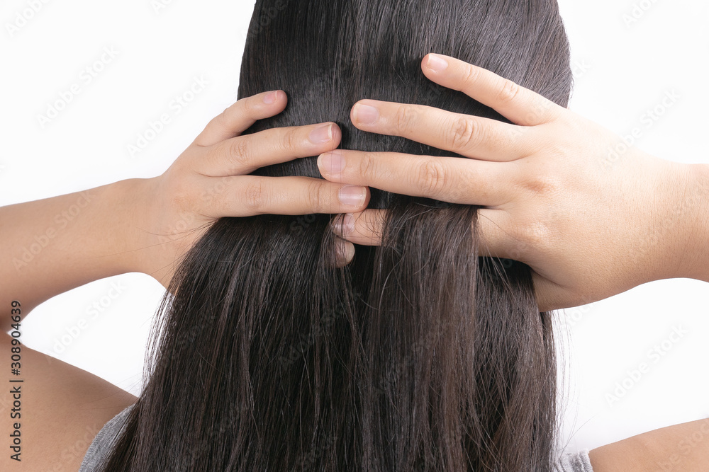 Fototapeta premium Beautiful young woman after procedure of hair extension in professional salon on white background.hair loss problem and Hair treatment concept