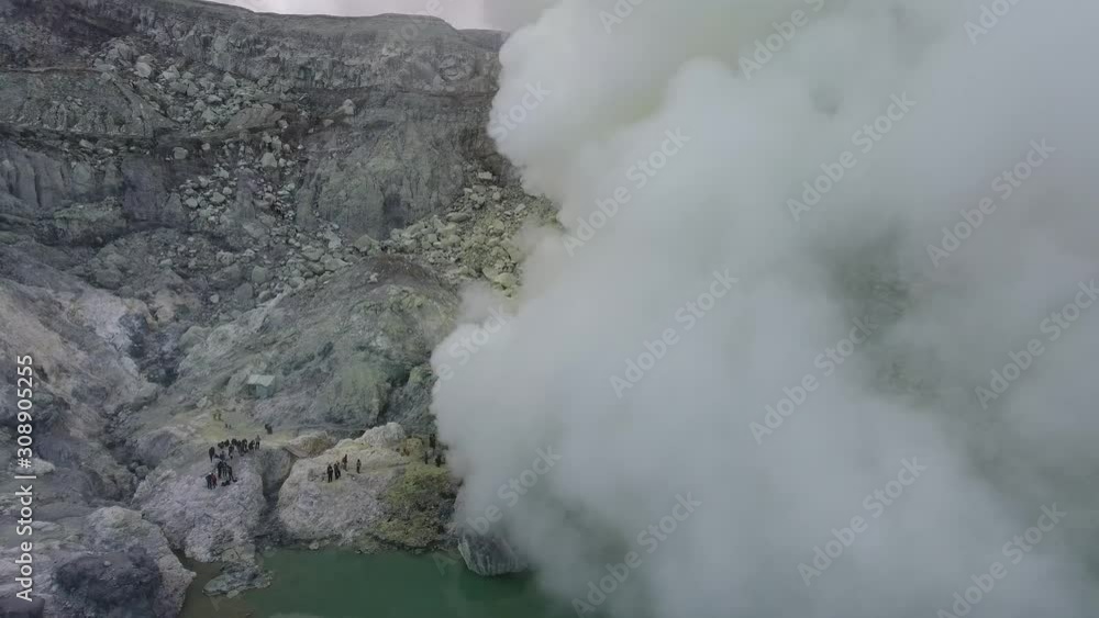 Group of tourists on the mountain is looking at a massive steam cloud, 4k Group of tourists on the mountain is looking at a massive steam cloud, 4k