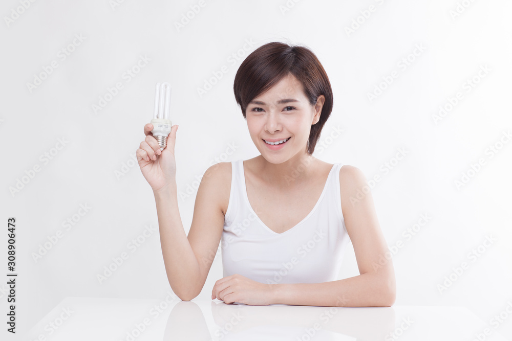 Young beautiful Asian female model on the white background Young beautiful Asian female model on the white background