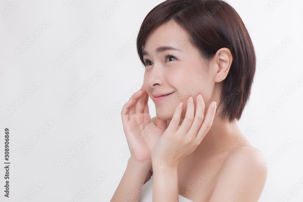 Young beautiful Asian female model on the white background Young beautiful Asian female model on the white background