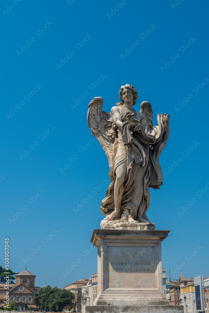 On the bridge of Sant Angelo the Angel with the Garment and Dice in Rome, Italy