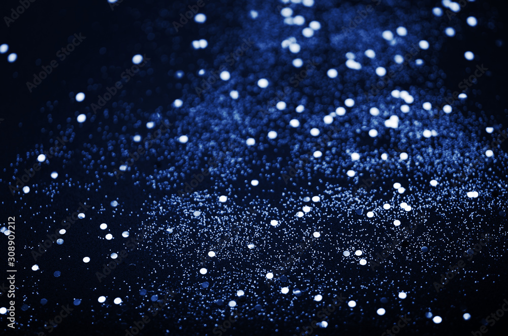 Blue sparkles on black background. Color of the year 2020 Classic Blue. - Image Blue sparkles on black background. Color of the year 2020 Classic Blue. - Image