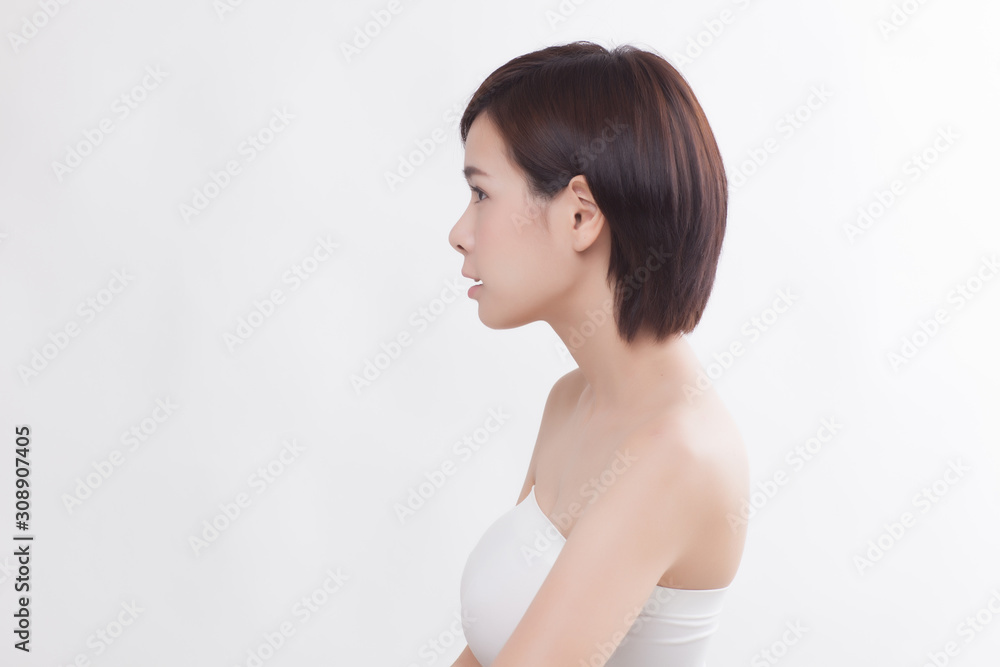 Young beautiful Asian female model on the white background Young beautiful Asian female model on the white background