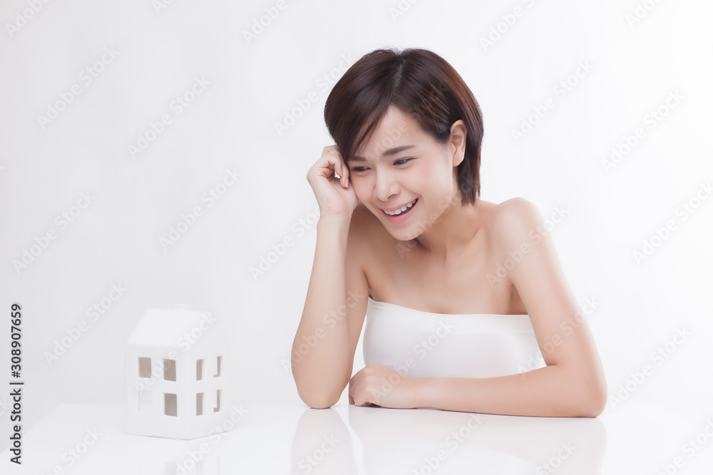 Young beautiful Asian female model on the white background Young beautiful Asian female model on the white background