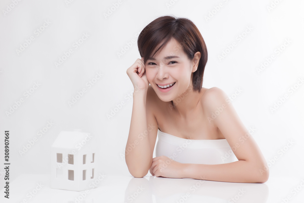 Young beautiful Asian female model on the white background