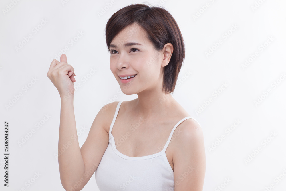 Young beautiful Asian short hair female model on white background Young beautiful Asian short hair female model on white background