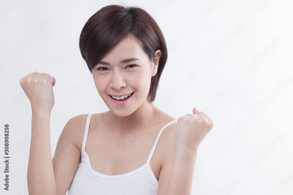 Young beautiful Asian short hair female model on white background Young beautiful Asian short hair female model on white background