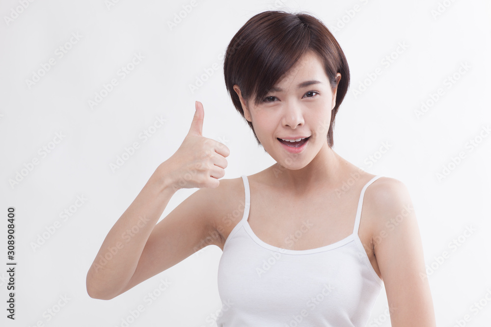 Young beautiful Asian short hair female model on white background Young beautiful Asian short hair female model on white background