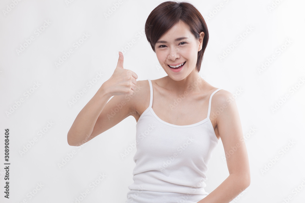 Young beautiful Asian short hair female model on white background Young beautiful Asian short hair female model on white background