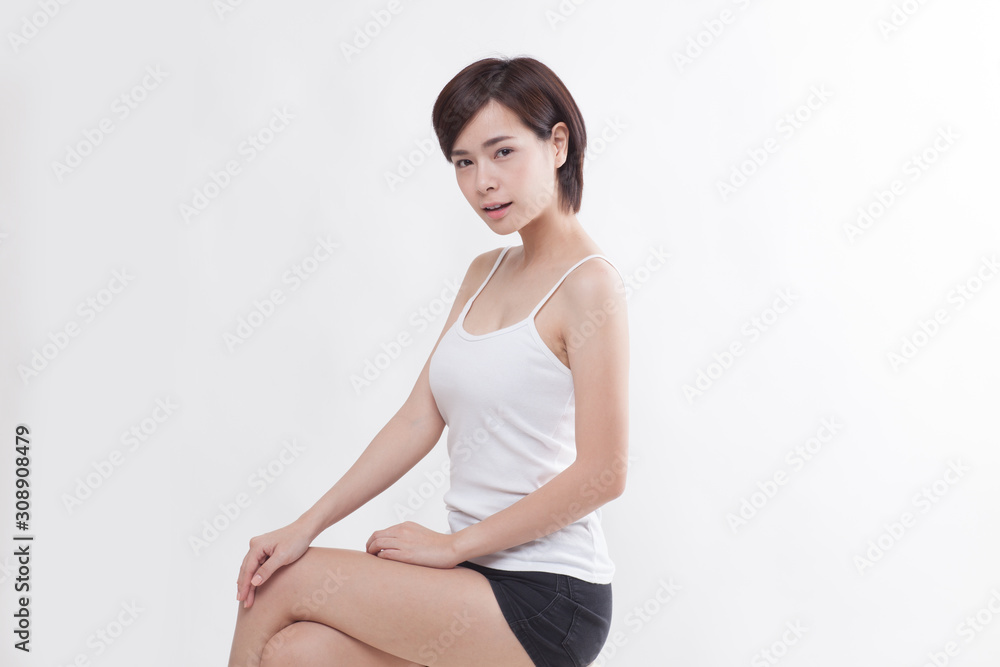 Obraz premium Young beautiful Asian short hair female model on white background
