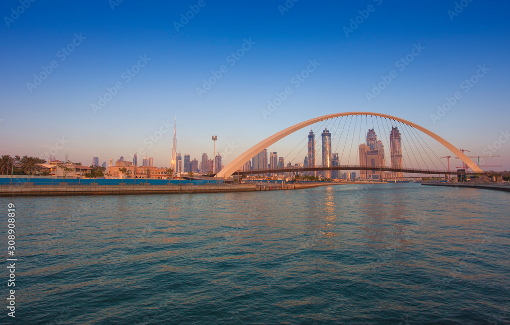 Tolerance bridge and boat in Dubai city, UAE