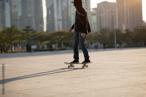 Skateboarder skateboarding at sunset city © lzf