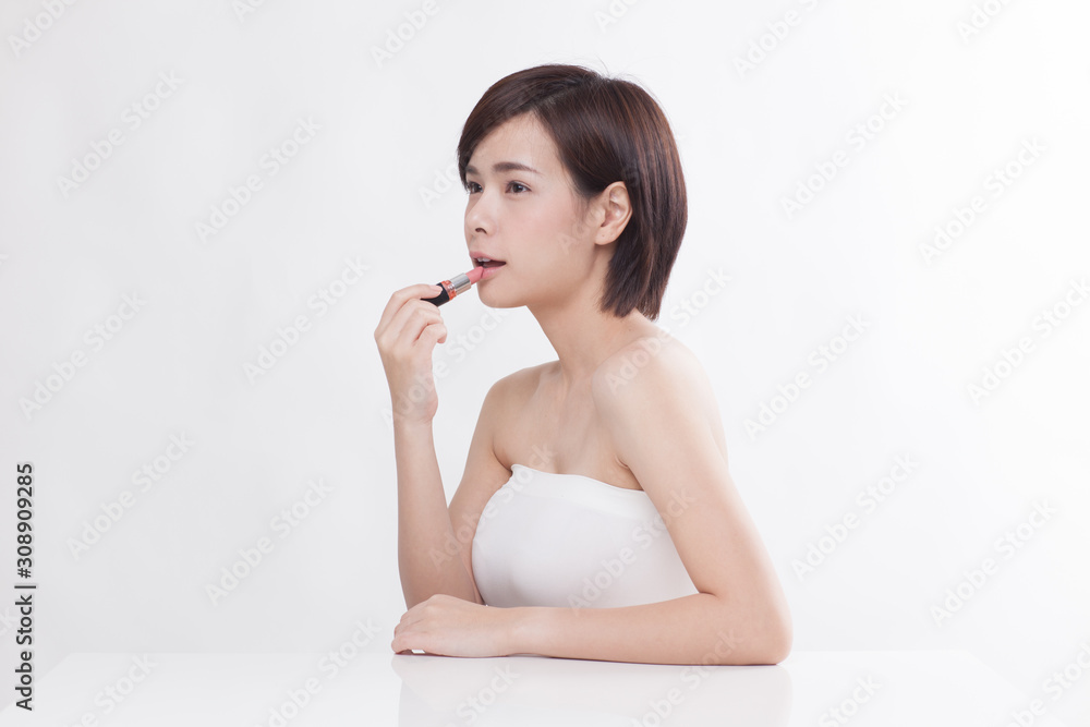 Young beautiful Asian short hair female model on white background Young beautiful Asian short hair female model on white background