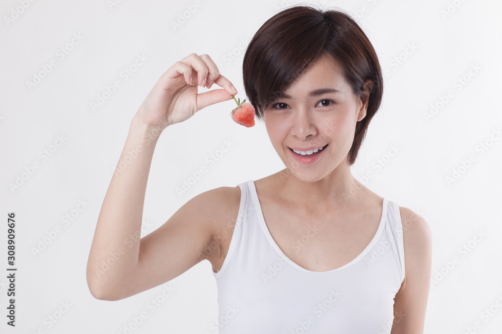 Young beautiful Asian female model on the white background for business concept Young beautiful Asian female model on the white background for business concept