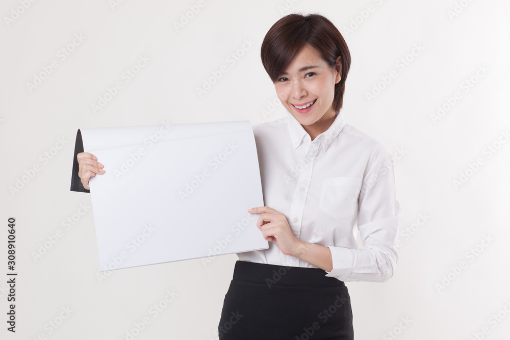 Young beautiful Asian female model on the white background for business concept Young beautiful Asian female model on the white background for business concept