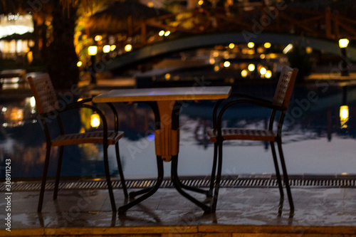 A place for a romantic dinner by the pool at the resort.