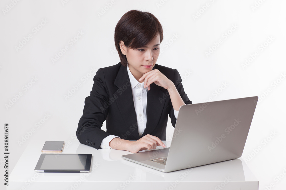Young Asian short hair female model in formal dress which is good for business purpose Young Asian short hair female model in formal dress which is good for business purpose