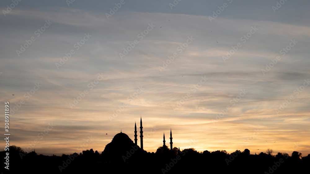 Istanbul travel destination in sunset with a silhouette of a mosque