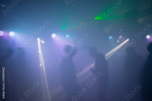 Dancing silhouette lights and Laser dico nightclub