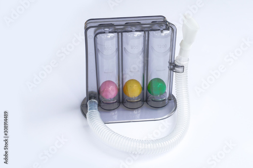 Triflow incentive spirometer for inhalation exercise on white background, Triball 