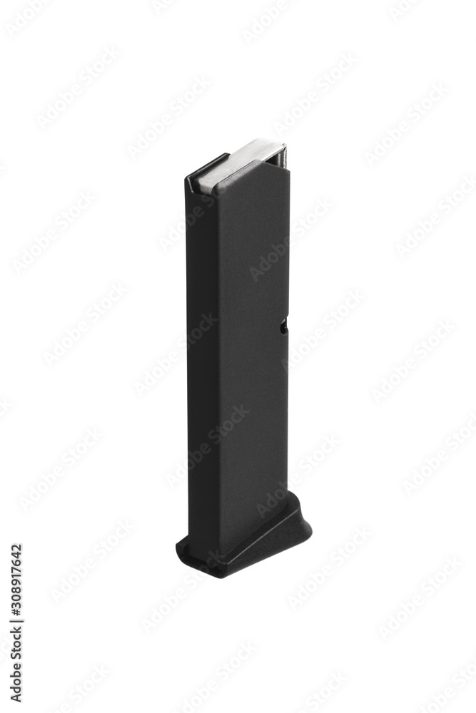 Handgun magazine on white surface. Clip for a modern semi-automatic pistol isolate on a white background. Handgun magazine on white surface. Clip for a modern semi-automatic pistol isolate on a white background.