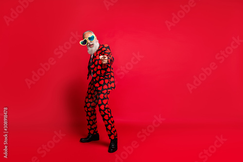 Full length body size view of nice cool cheerful cheery glad positive white-haired guy having fun pointing take pick you young body soul isolated on bright vivid shine vibrant red color background photo