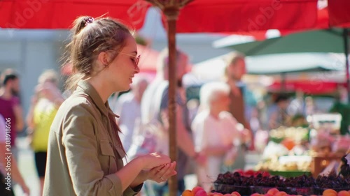Buying fruit at food market