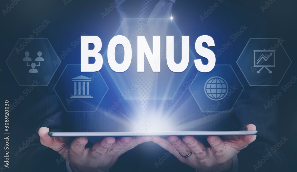 Businessman holding a computer tablet display projecting a Bonus concept.