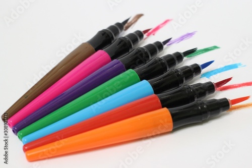  color pencils, paints on a white background, isolated, selective focus