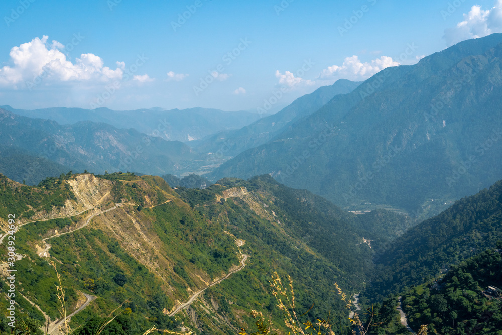 Road from Kausani to Nainital in picture perfect view of the Uttarakhand landscape