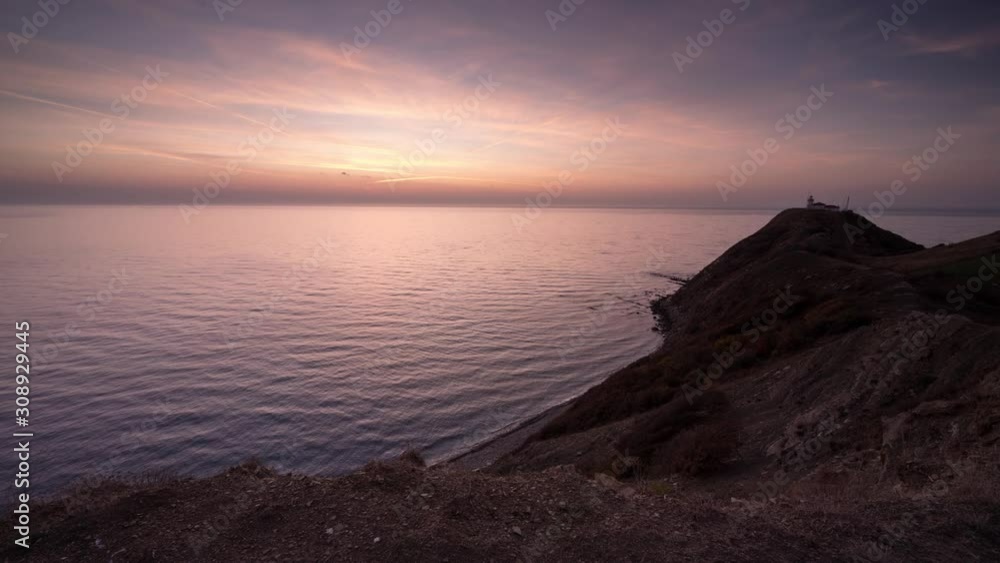 Night to day time lapse with the lighthouse at Cape Emine, surrounded by sea and mountain slopes - Black sea coast, Bulgaria. 4K Time lapse. Night to day time lapse with the lighthouse at Cape Emine, surrounded by sea and mountain slopes - Black sea coast, Bulgaria. 4K Time lapse.