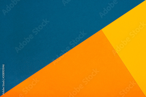 Abstract geometric paper background. Trendy blue and orange colors, active lines.