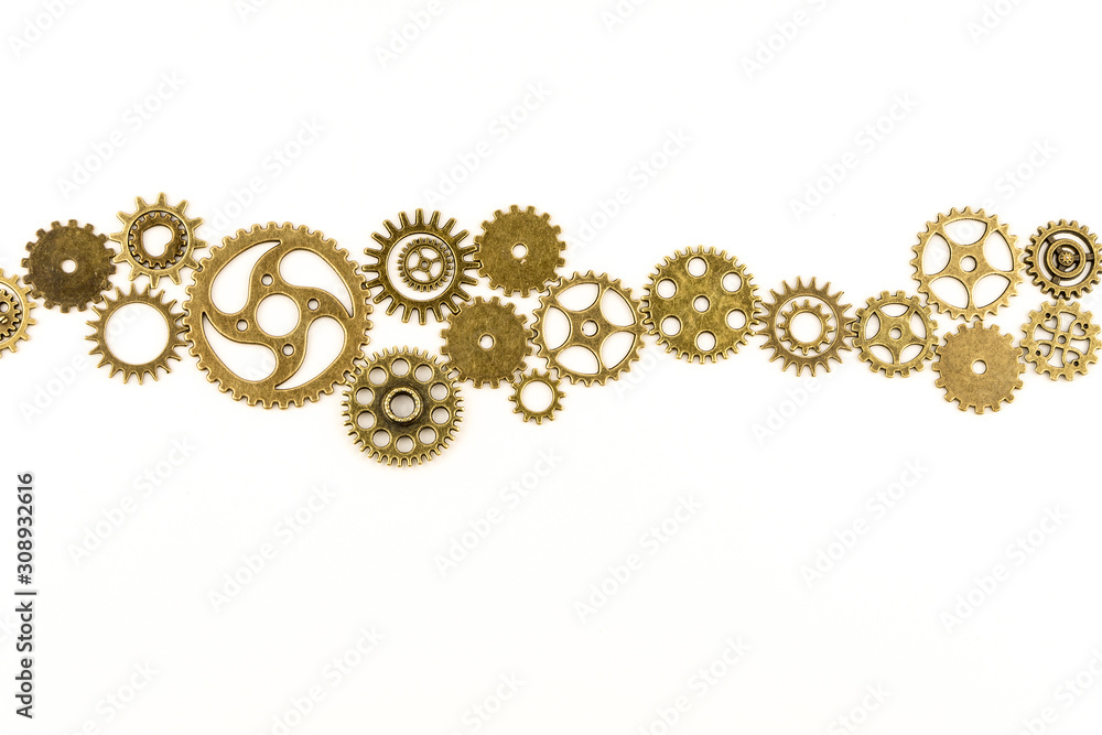 metallic gears background / Closeup of metal cog gears / close up texture pattern steampunk style and old mechanical peaces / decorative frame metallic gears background / Closeup of metal cog gears / close up texture pattern steampunk style and old mechanical peaces / decorative frame