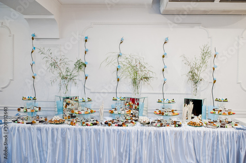 Dessert table of delicious sweets on wedding reception. © AS Photo Family
