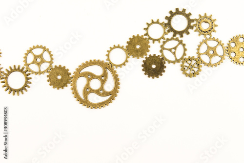 metallic gears background / Closeup of metal cog gears / close up texture pattern steampunk style and old mechanical peaces / decorative frame