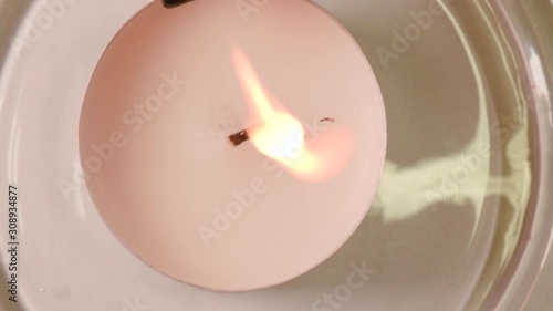 wax melt and stamp pour from wax, close up from above, soft focus