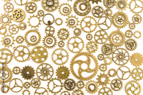 metallic gears background / Closeup of metal cog gears / close up texture pattern steampunk style and old mechanical peaces / decorative frame