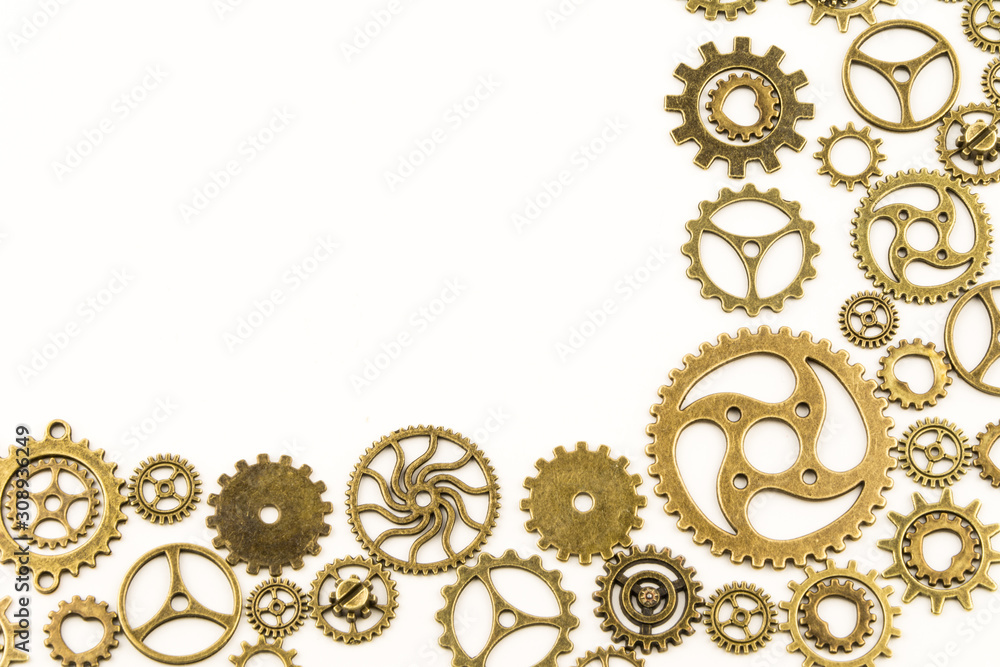 metallic gears background / Closeup of metal cog gears / close up texture pattern steampunk style and old mechanical peaces / decorative frame metallic gears background / Closeup of metal cog gears / close up texture pattern steampunk style and old mechanical peaces / decorative frame