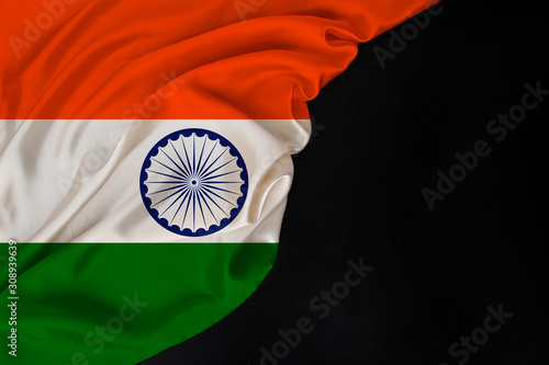 national flag of modern india state, beautiful silk, black blank, concept of tourism, economy, politics, emigration, independence day, copy space, template, horizontal