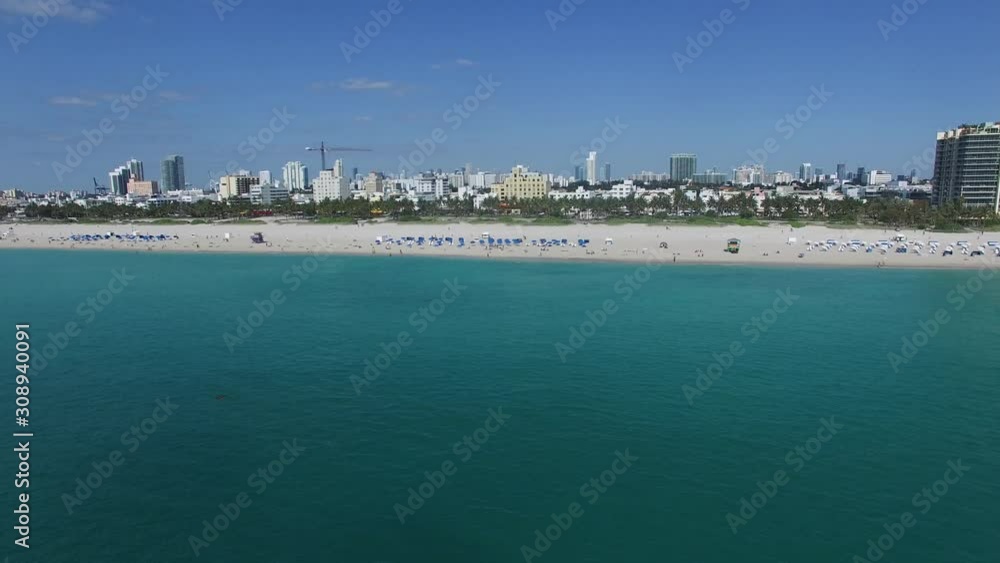 4K Drone descending towards the sea on Miami South Beach 4K Drone descending towards the sea on Miami South Beach