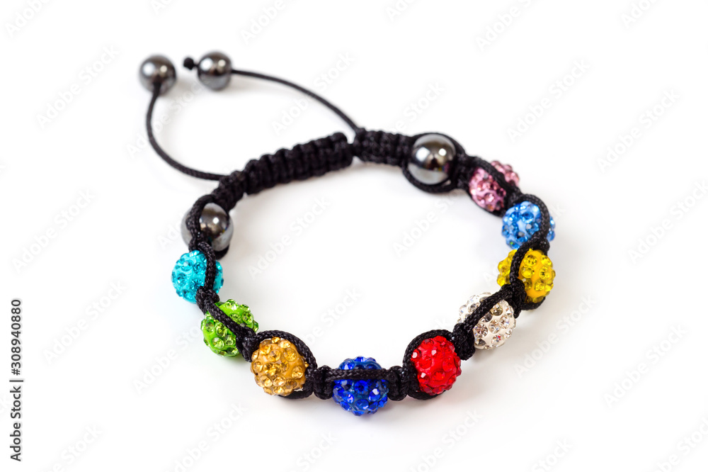 woven bracelet with multi-colored round beads on the arm woven bracelet with multi-colored round beads on the arm