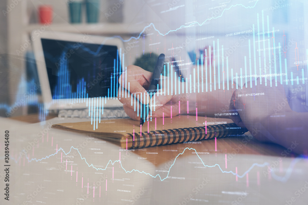 Financial graph displayed on woman's hand taking notes background. Concept of research. Double exposure Financial graph displayed on woman's hand taking notes background. Concept of research. Double exposure