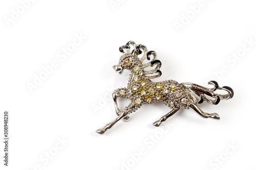 Brooch in the shape of a horse with shiny stones © Pavlo