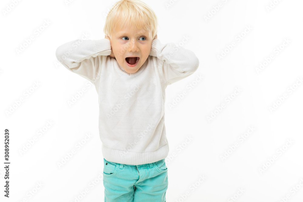 Little boy with short blonde hair, blue eyes screams, picture isolated on white background Little boy with short blonde hair, blue eyes screams, picture isolated on white background