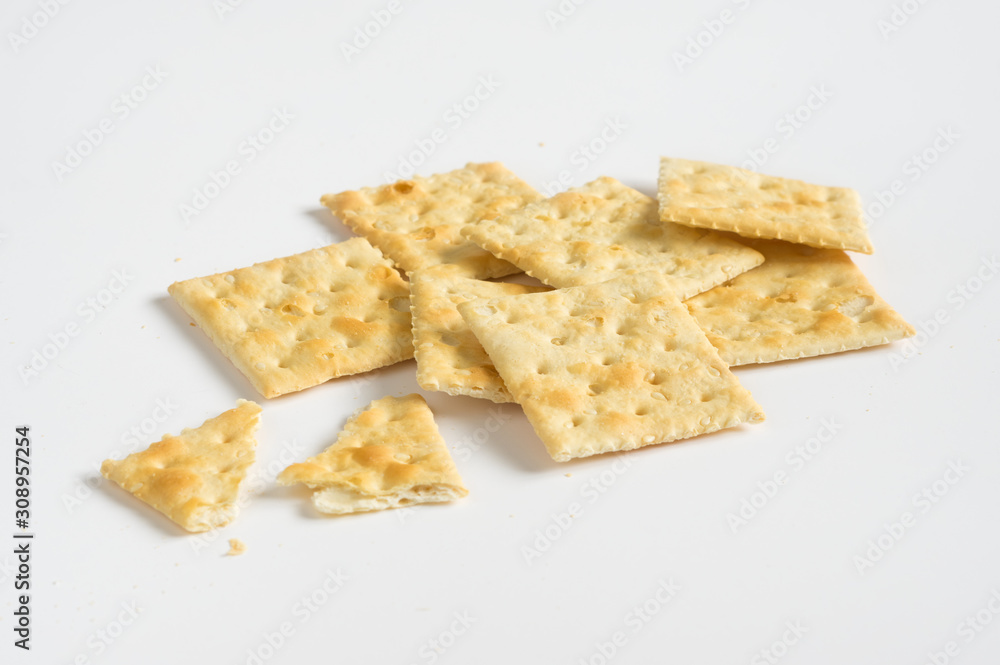 Crispy crackers or cookies on white background. Crispy crackers or cookies on white background.