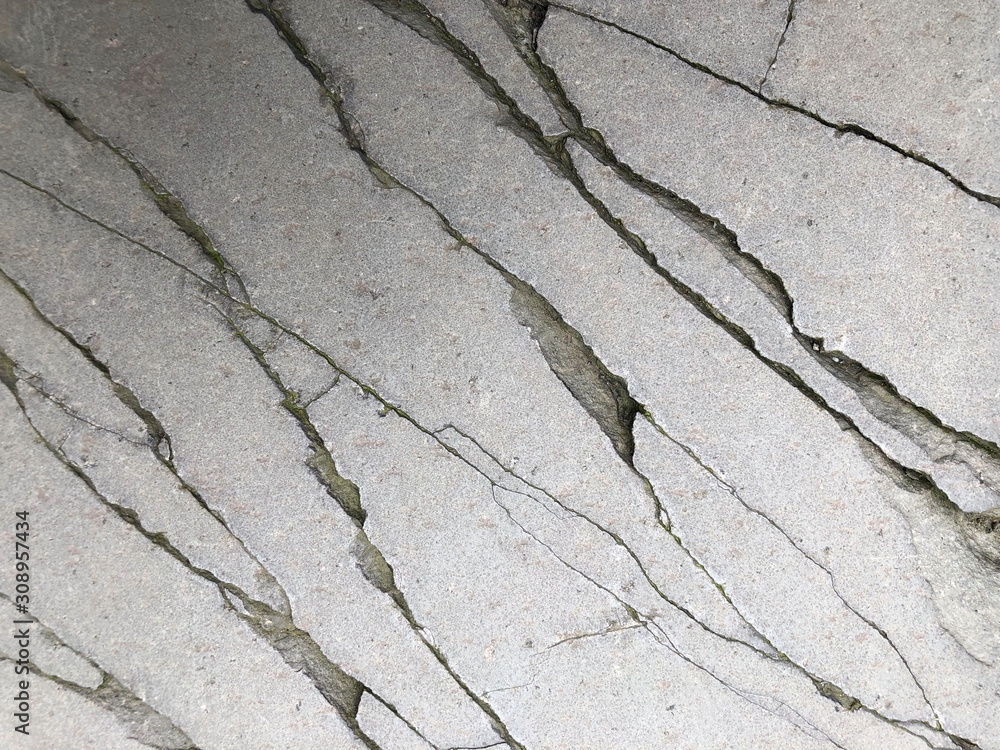 Obraz premium Cracked concrete texture closeup background