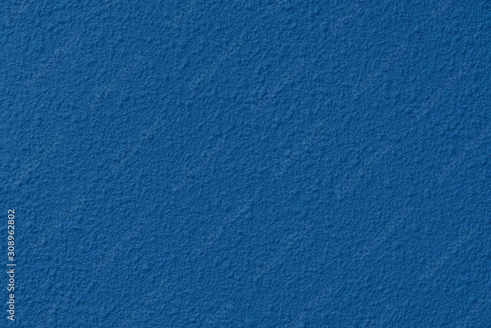 Elegant dark blue colored Concrete textured background with roughness and irregularities to your design or product. 2020 color trend concept. Elegant dark blue colored Concrete textured background with roughness and irregularities to your design or product. 2020 color trend concept.