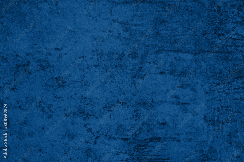 Elegant dark blue colored Concrete textured background with roughness and irregularities to your design or product. 2020 color trend concept.