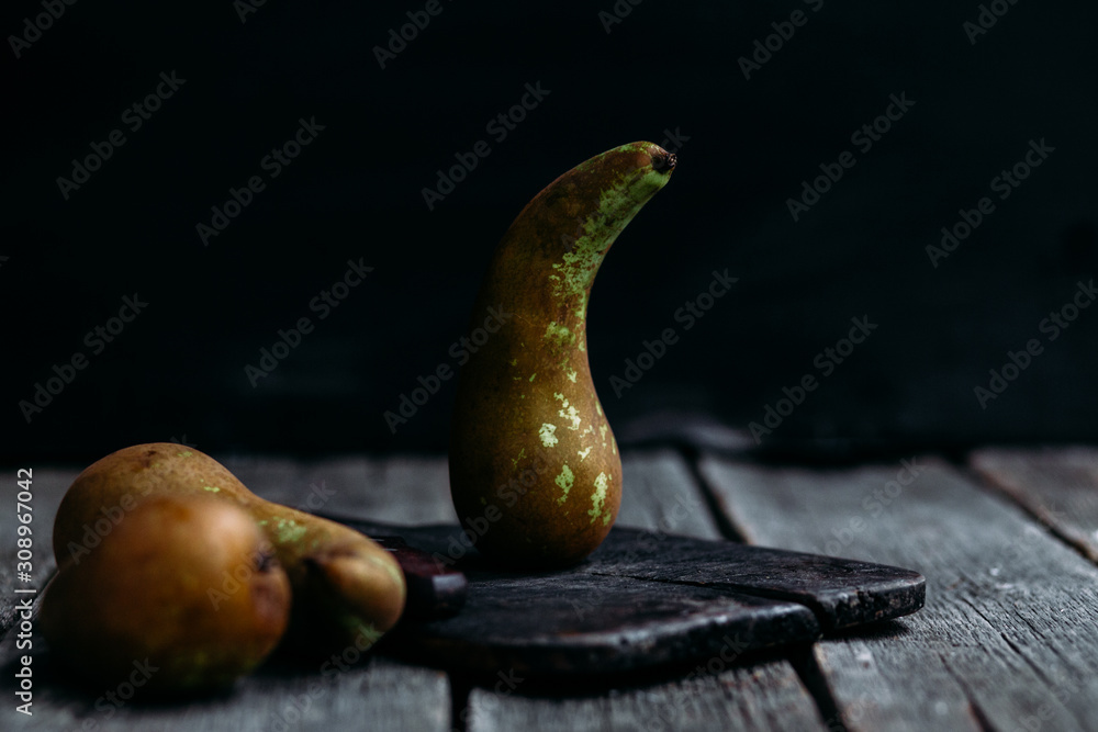Conference pears on an old wooden table